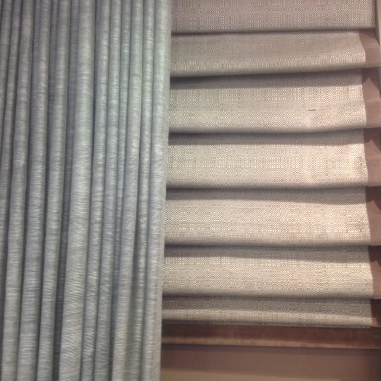 insulating shades draperies and wood shutters